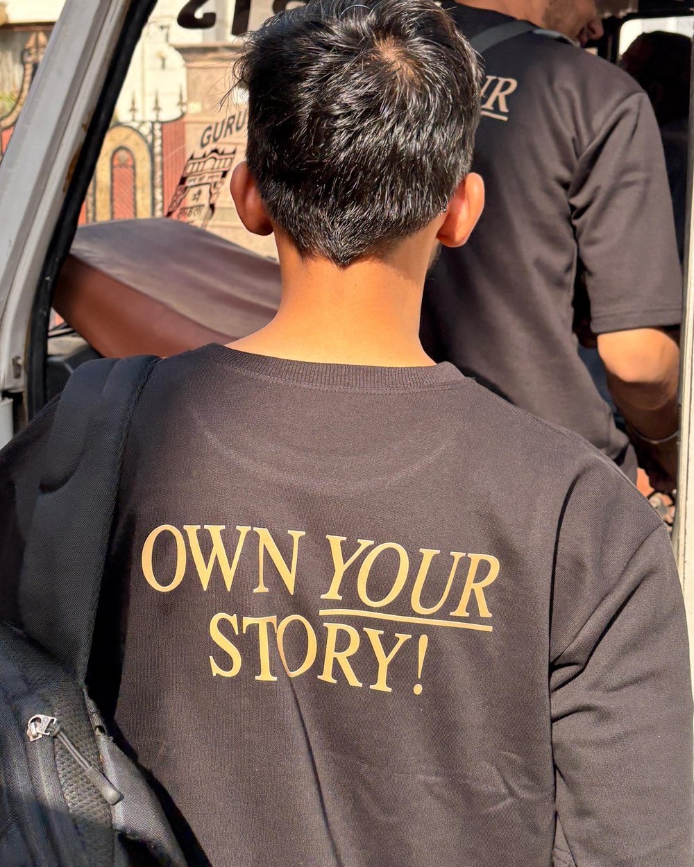 Own Your Story team sweatshirt